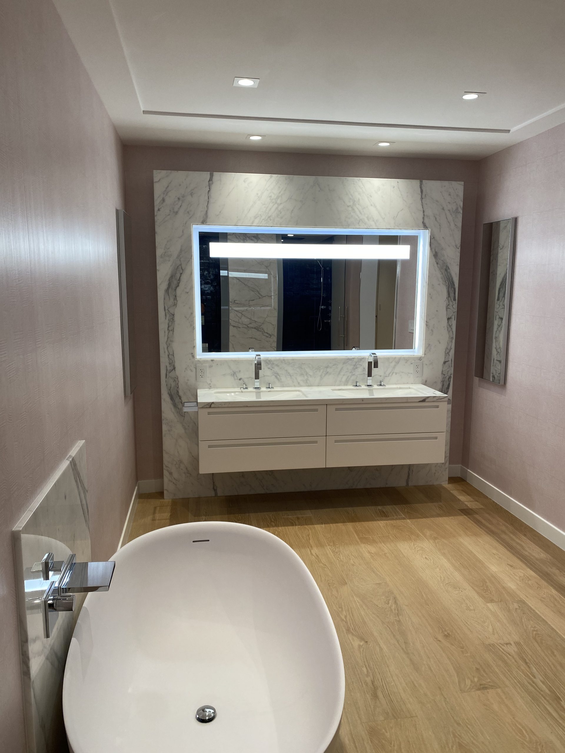 Luxury primary bathroom in a Fisher Island residence
